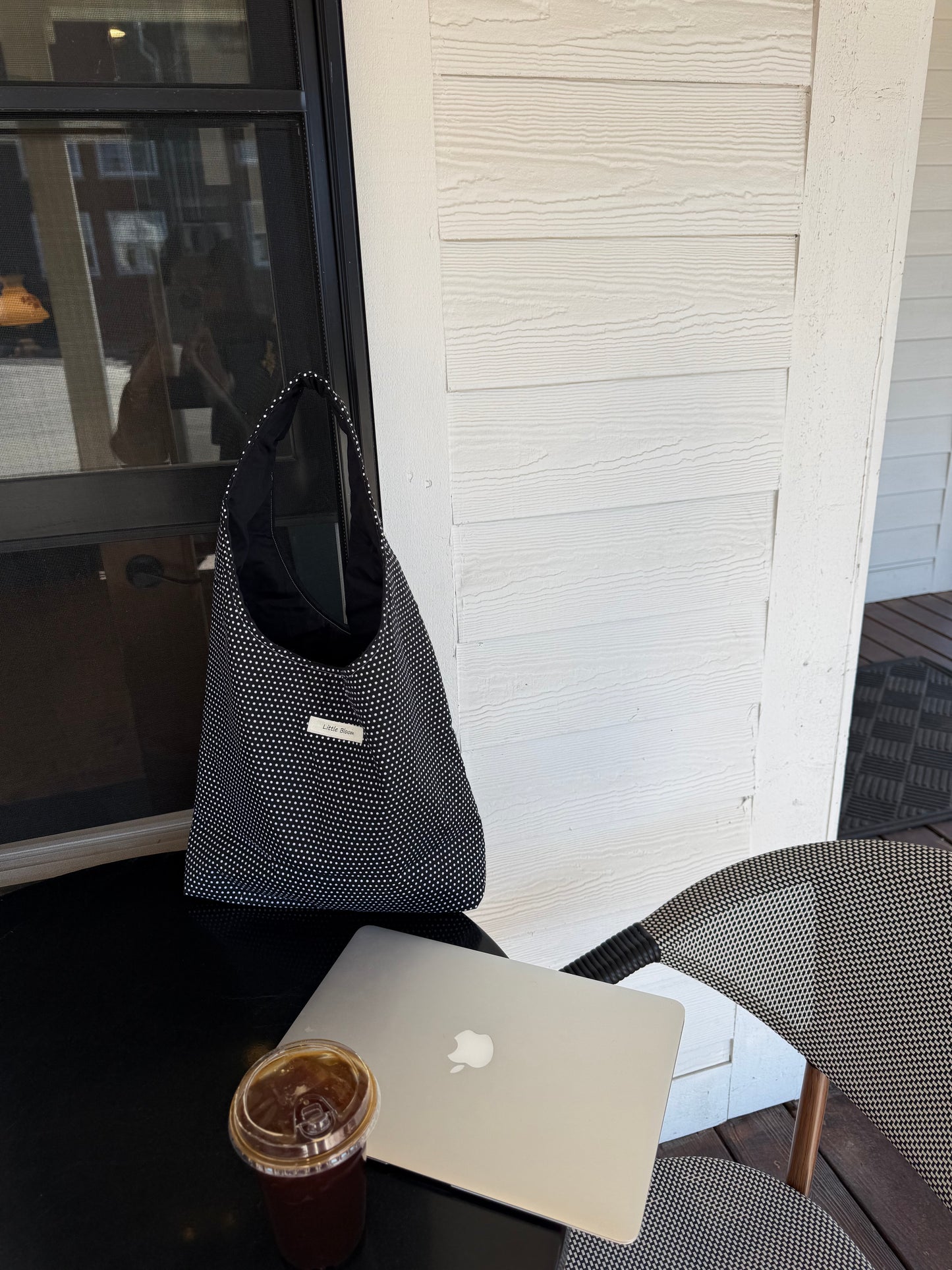 Black polka dot bag